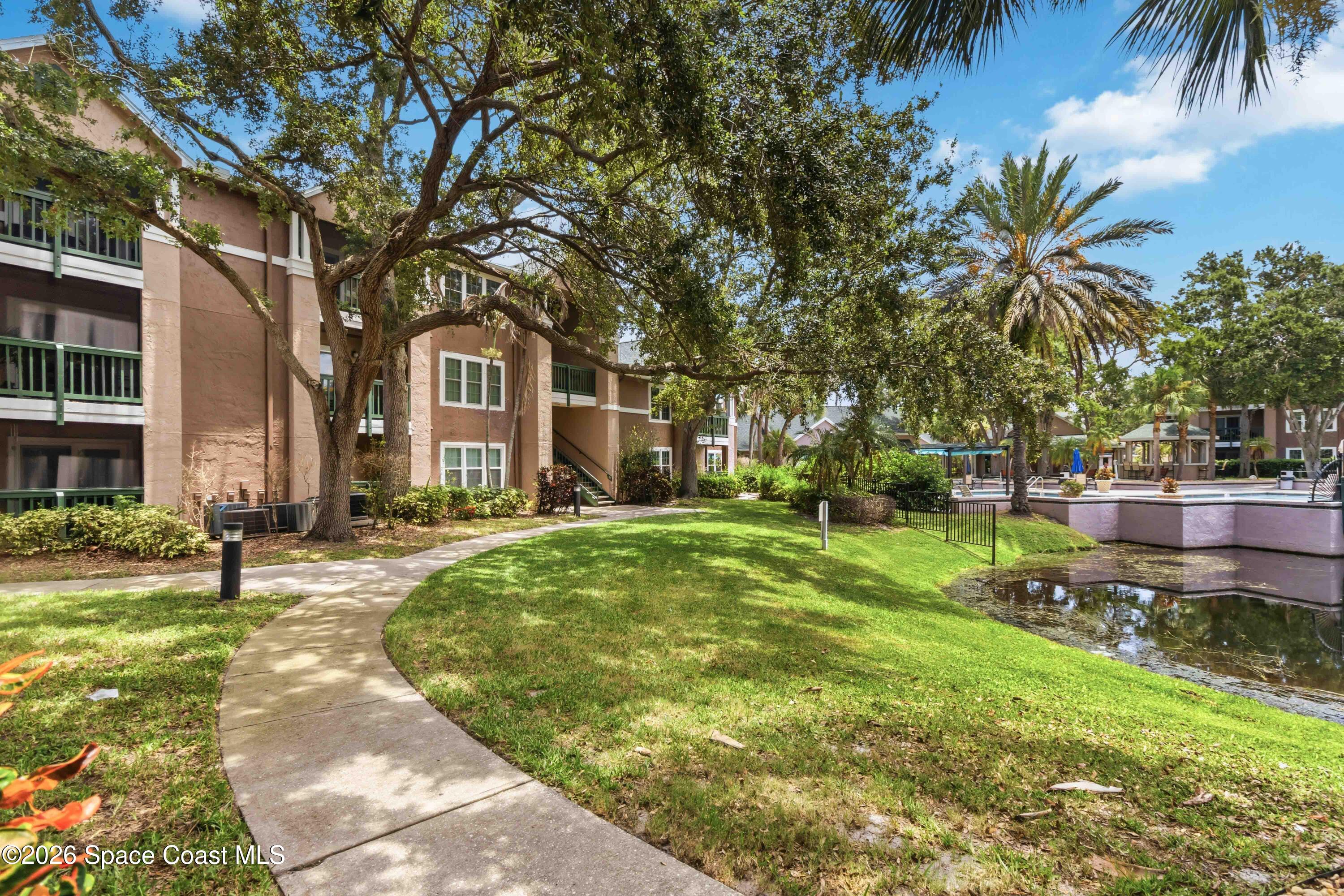 7667 North Wickham Road, Unit 519 Melbourne, FL 32940 - Photo 15 of 18 Well-kept Grounds