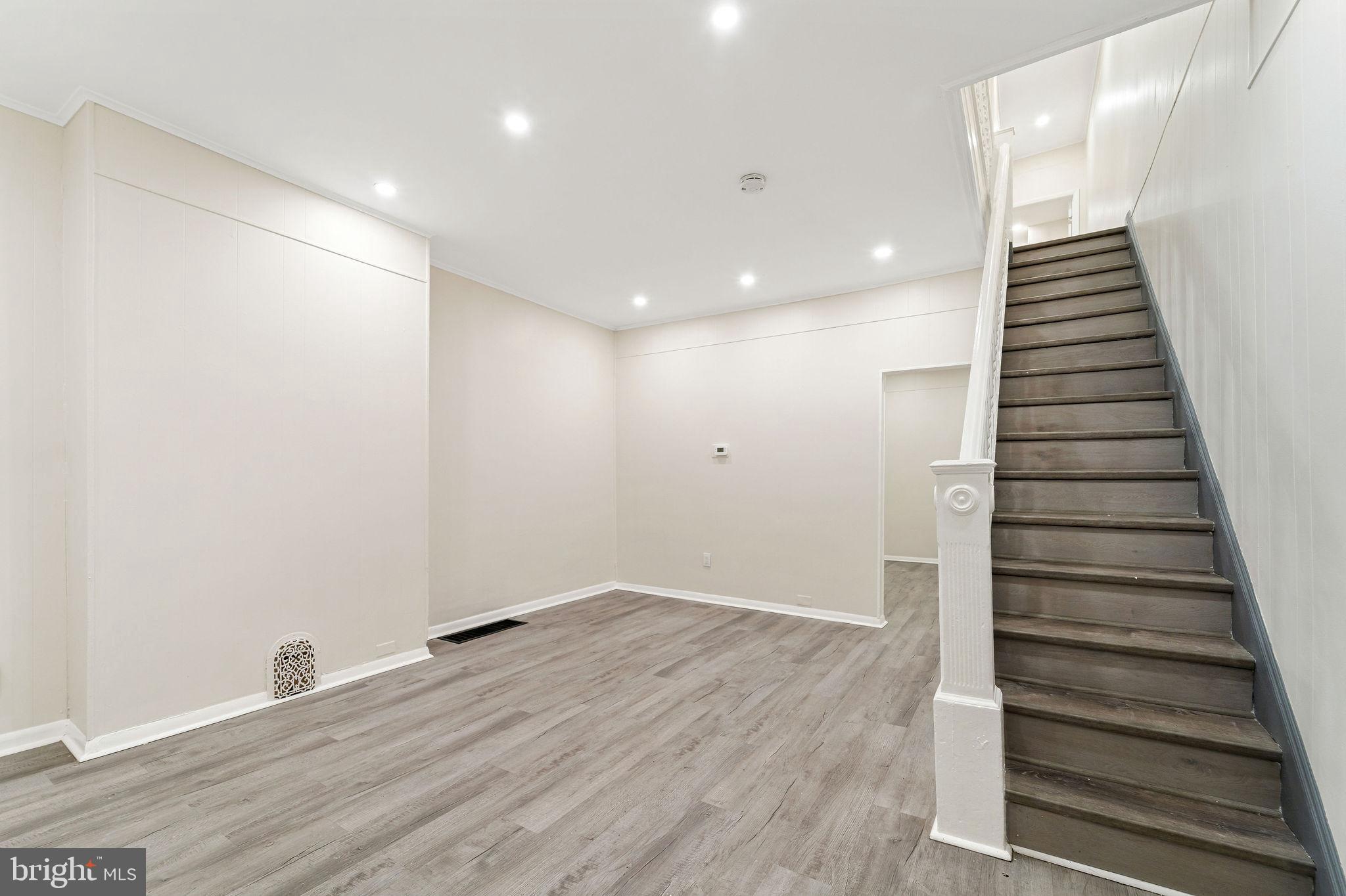 705 North 7th Street Camden, NJ 08102 - Photo 4 of 25 a view of entryway with wooden floor