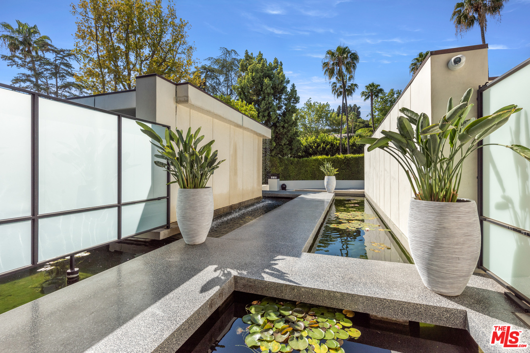 920 Foothill Road Beverly Hills, CA 90210 - Photo 5 of 26 a view of outdoor along with deck and outdoor seating