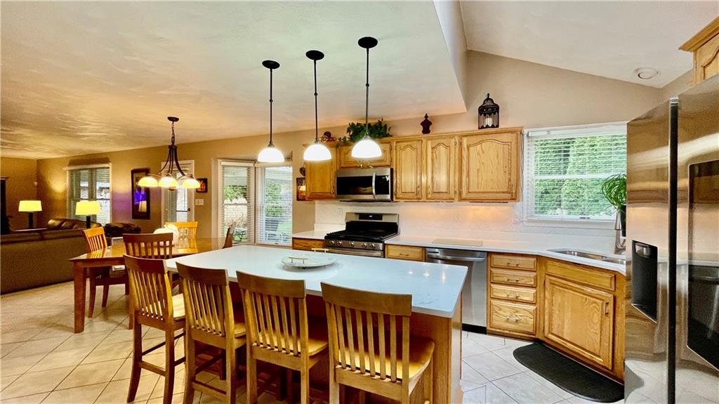 681 Adele Drive Irwin, PA 15642 - Photo 5 of 36 a view of a dining room and furniture window and outside view