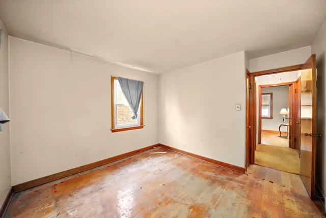 a kitchen with stainless steel appliances granite countertop a stove a refrigerator and a cabinets