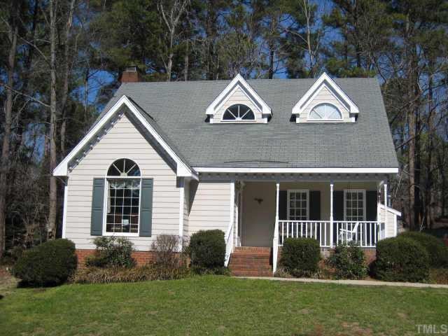 4804 Lancashire Drive Raleigh, NC 27613 - Photo 1 of 10 a view of a house with a yard and a garden