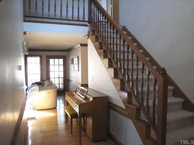 4804 Lancashire Drive Raleigh, NC 27613 - Photo 4 of 10 a view of entryway and hall with wooden floor