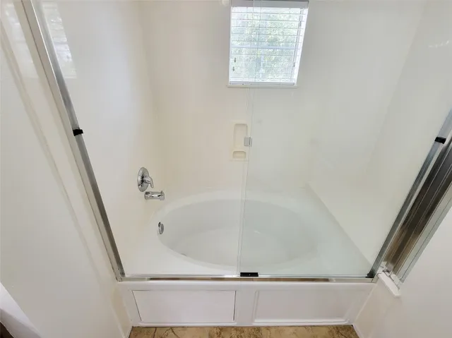 a bathroom with a bathtub