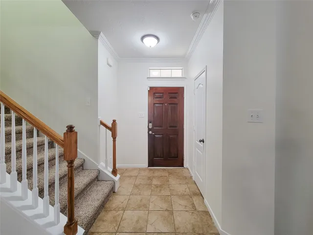 a view of entryway with stairs