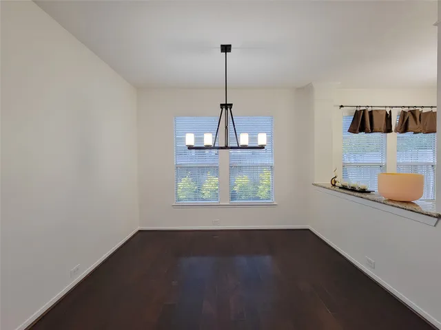 a kitchen with sink and window