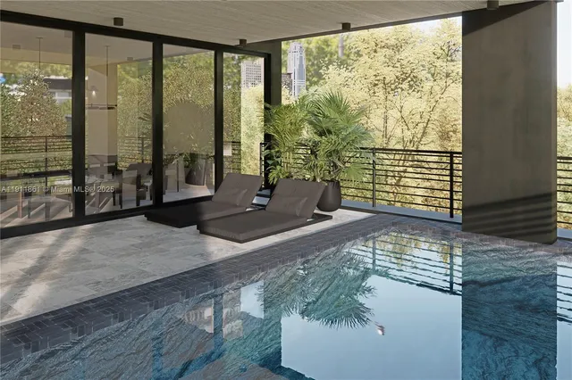 a view of a living room and floor to ceiling window or wooden floor