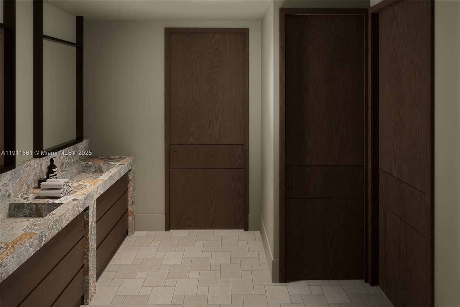 1445 Bay Road Miami Beach, FL 33139 - Photo 22 of 27 a bathroom with a granite countertop sink and a mirror