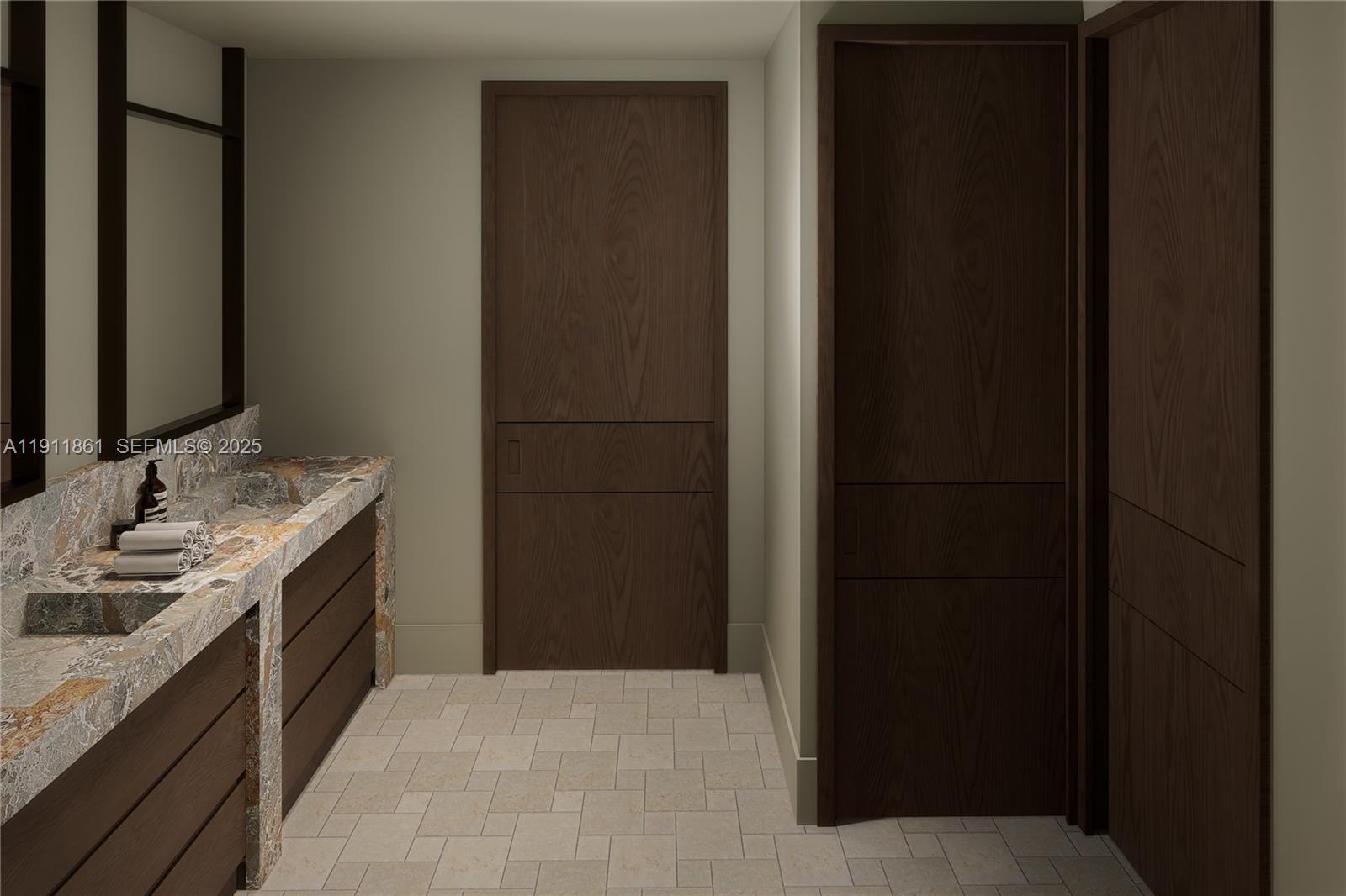 1445 Bay Road Miami Beach, FL 33139 - Photo 22 of 27 a bathroom with a granite countertop sink and a mirror