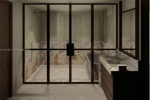 a bathroom with a sink and mirror