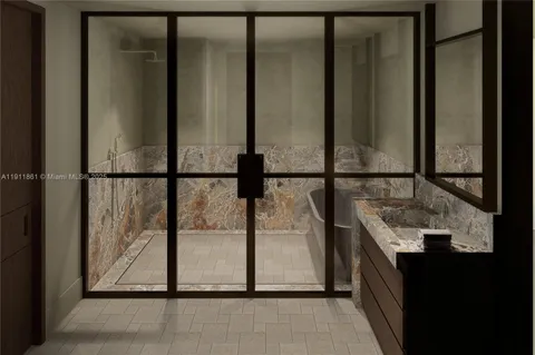 a bathroom with a sink and mirror