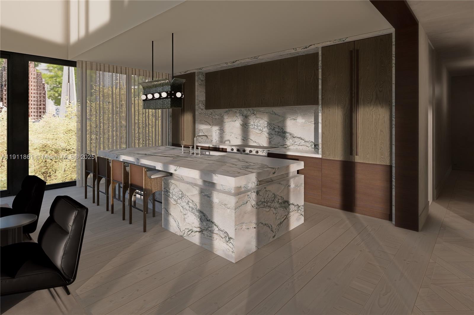 1445 Bay Road Miami Beach, FL 33139 - Photo 6 of 27 a kitchen with stainless steel appliances granite countertop a stove top oven a refrigerator a dining table and chairs with wooden floor