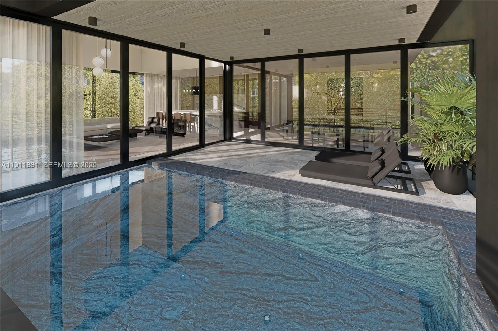 1445 Bay Road Miami Beach, FL 33139 - Photo 7 of 27 a view of a large room with large windows