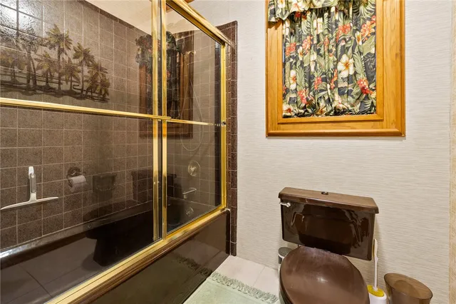 a bedroom with a bed and a closet