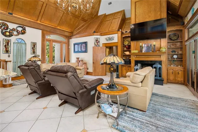 a living room with furniture or couch and a large window