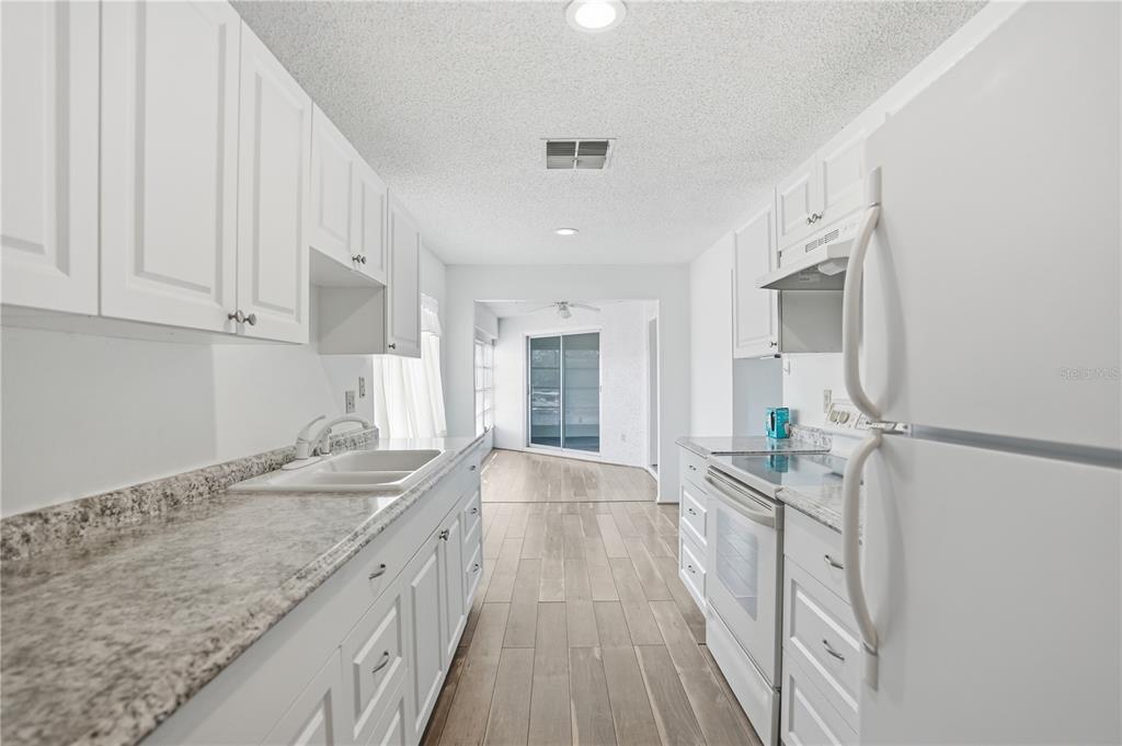 7744 St Andrews Boulevard, Unit 1 Weeki Wachee, FL 34613 - Photo 7 of 33