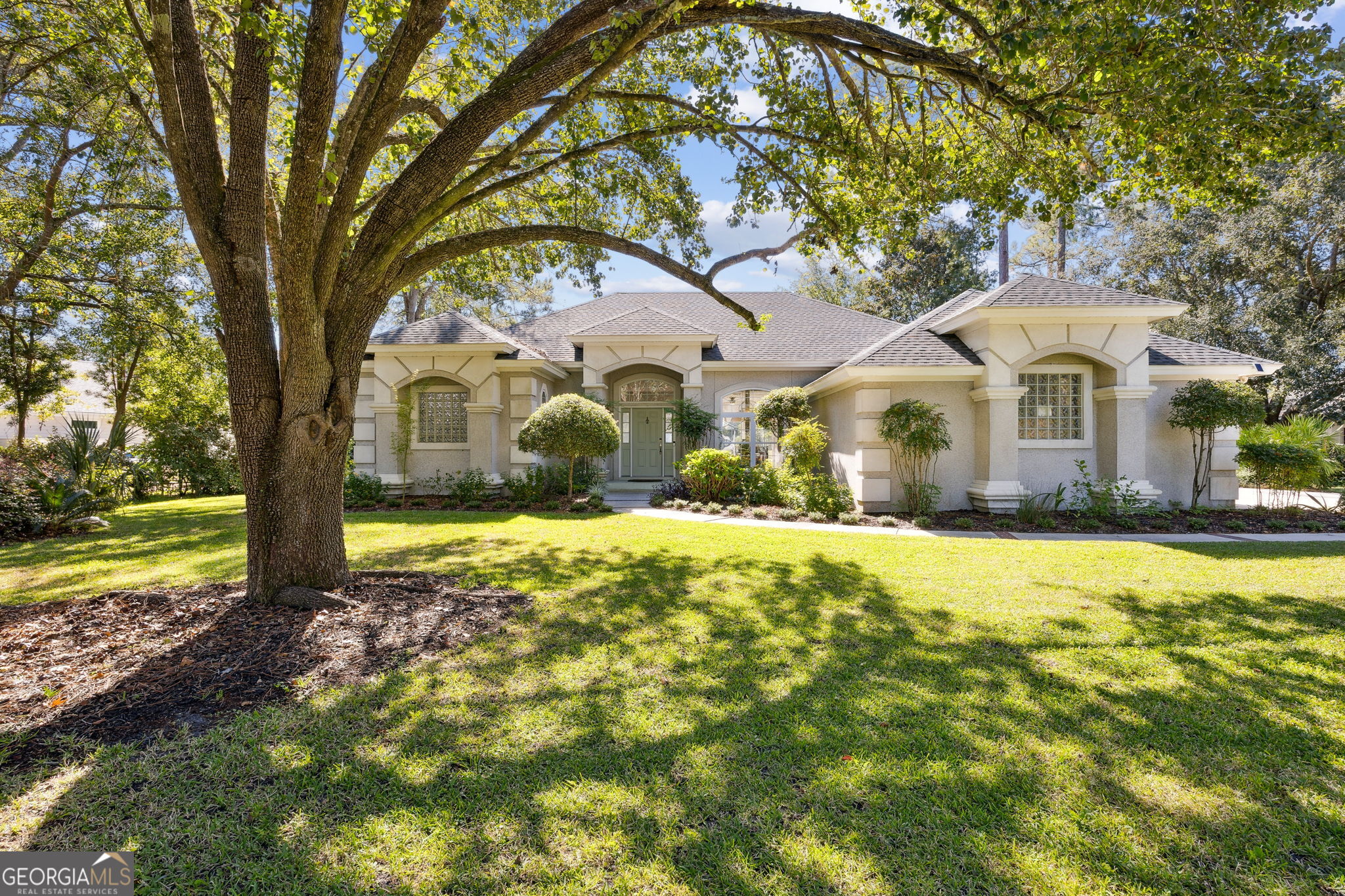 502 Cardinal Circle East St. Marys, GA 31558 - Photo 1 of 73 a front view of a house with a yard