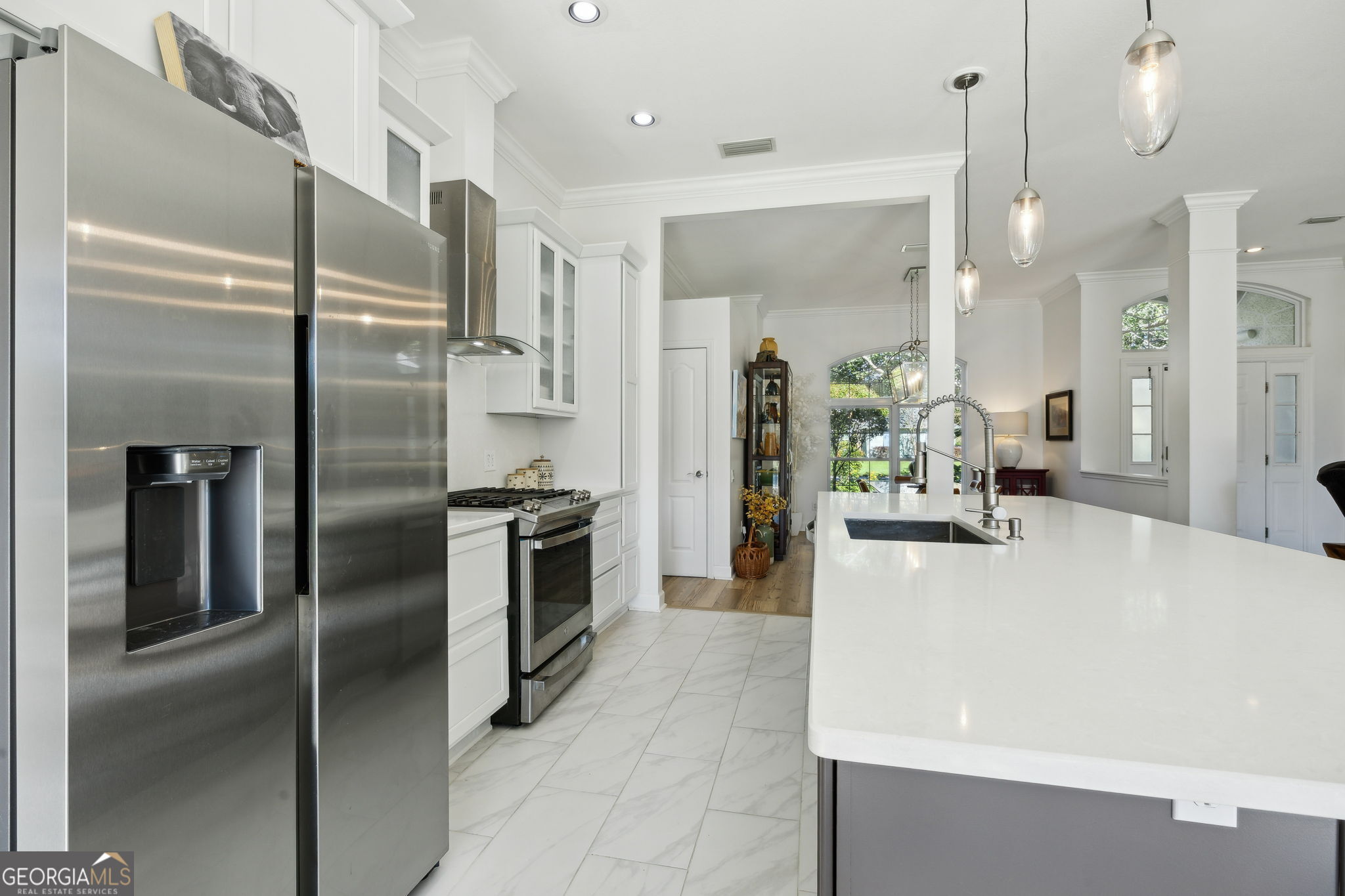 502 Cardinal Circle East St. Marys, GA 31558 - Photo 19 of 73 a large kitchen with stainless steel appliances a refrigerator and a counter top space