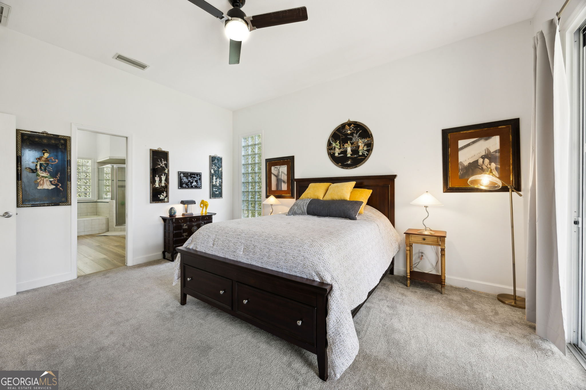 502 Cardinal Circle East St. Marys, GA 31558 - Photo 25 of 73 a bedroom with a bed and dresser