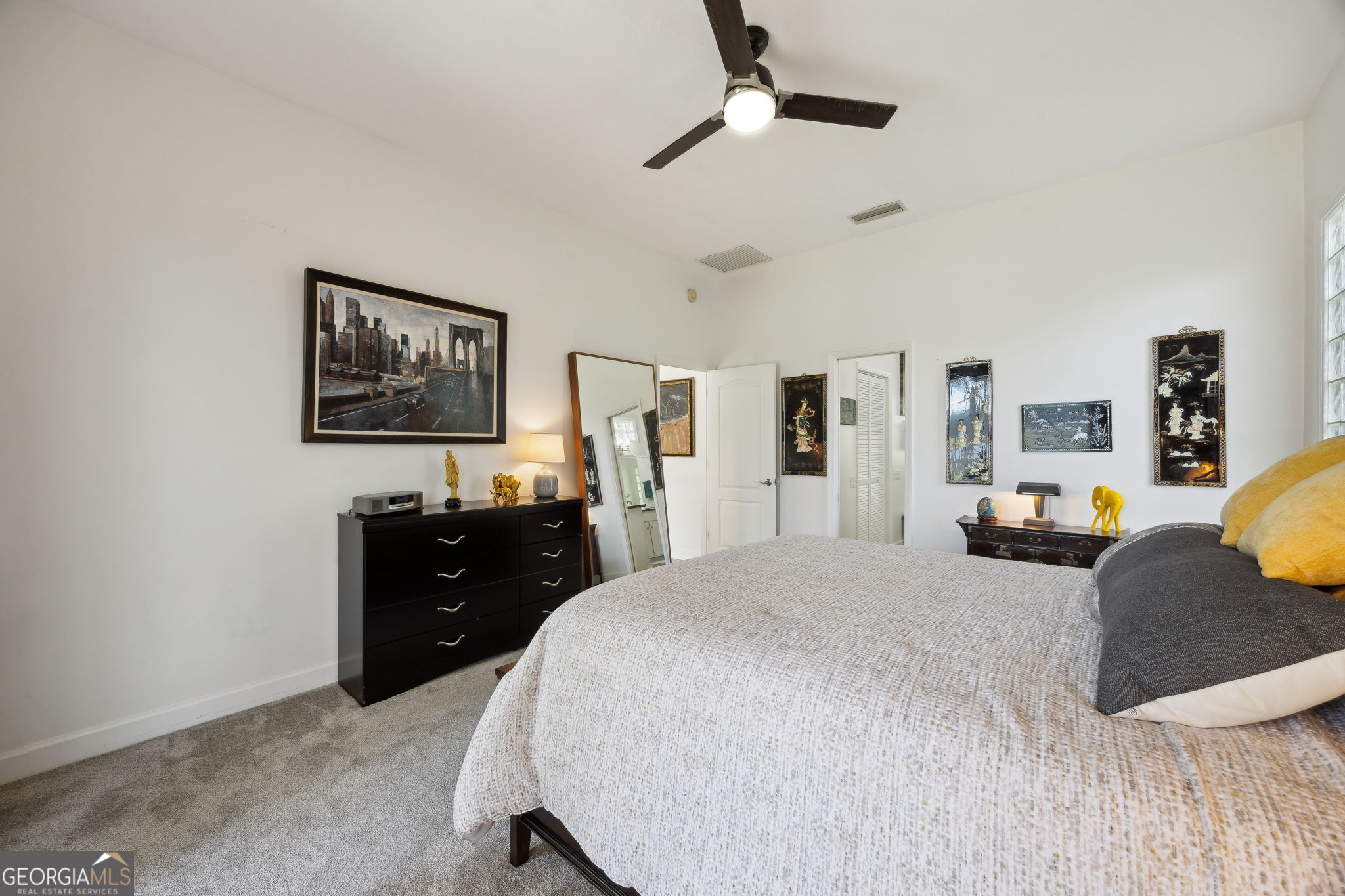 502 Cardinal Circle East St. Marys, GA 31558 - Photo 26 of 73 a bedroom with a bed and wooden floor