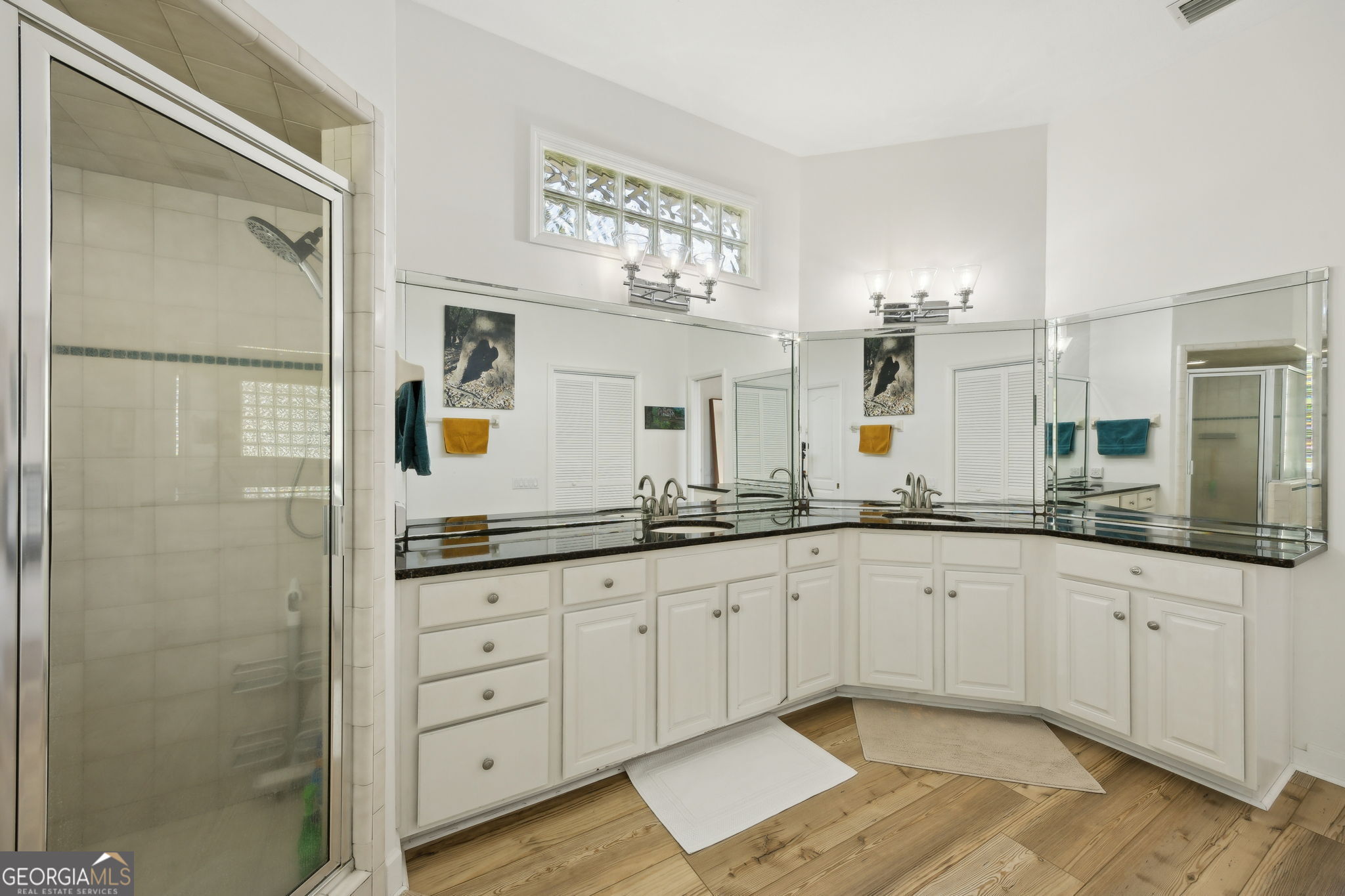 502 Cardinal Circle East St. Marys, GA 31558 - Photo 29 of 73 a spacious bathroom with a granite countertop sink mirror and a