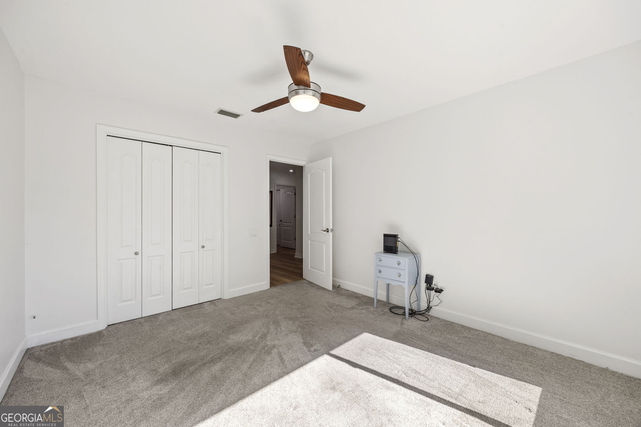 502 Cardinal Circle East St. Marys, GA 31558 - Photo 31 of 73 a very nice looking room with a ceiling fan