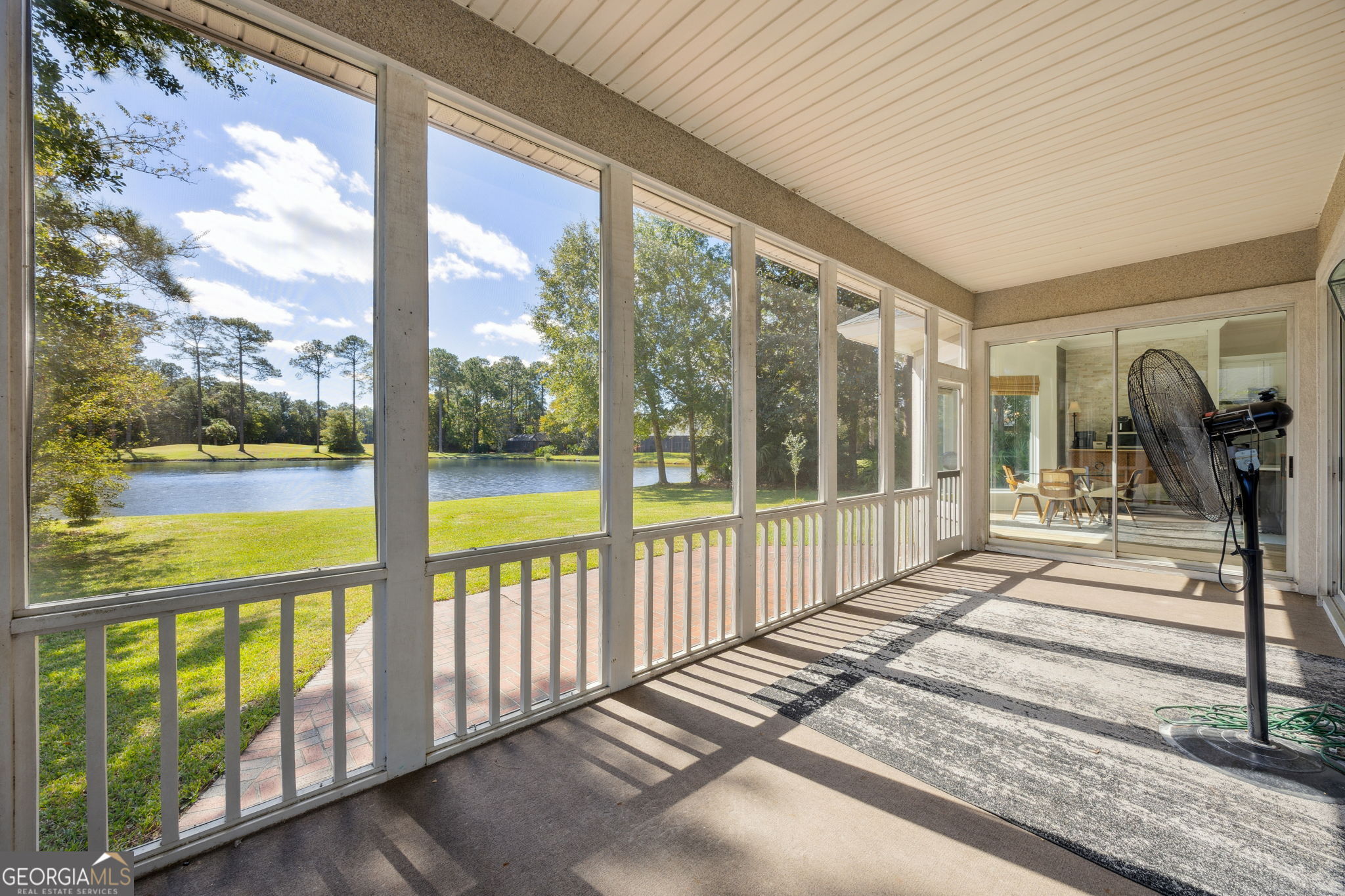 502 Cardinal Circle East St. Marys, GA 31558 - Photo 40 of 73 a view of a balcony with lake view and wooden floor