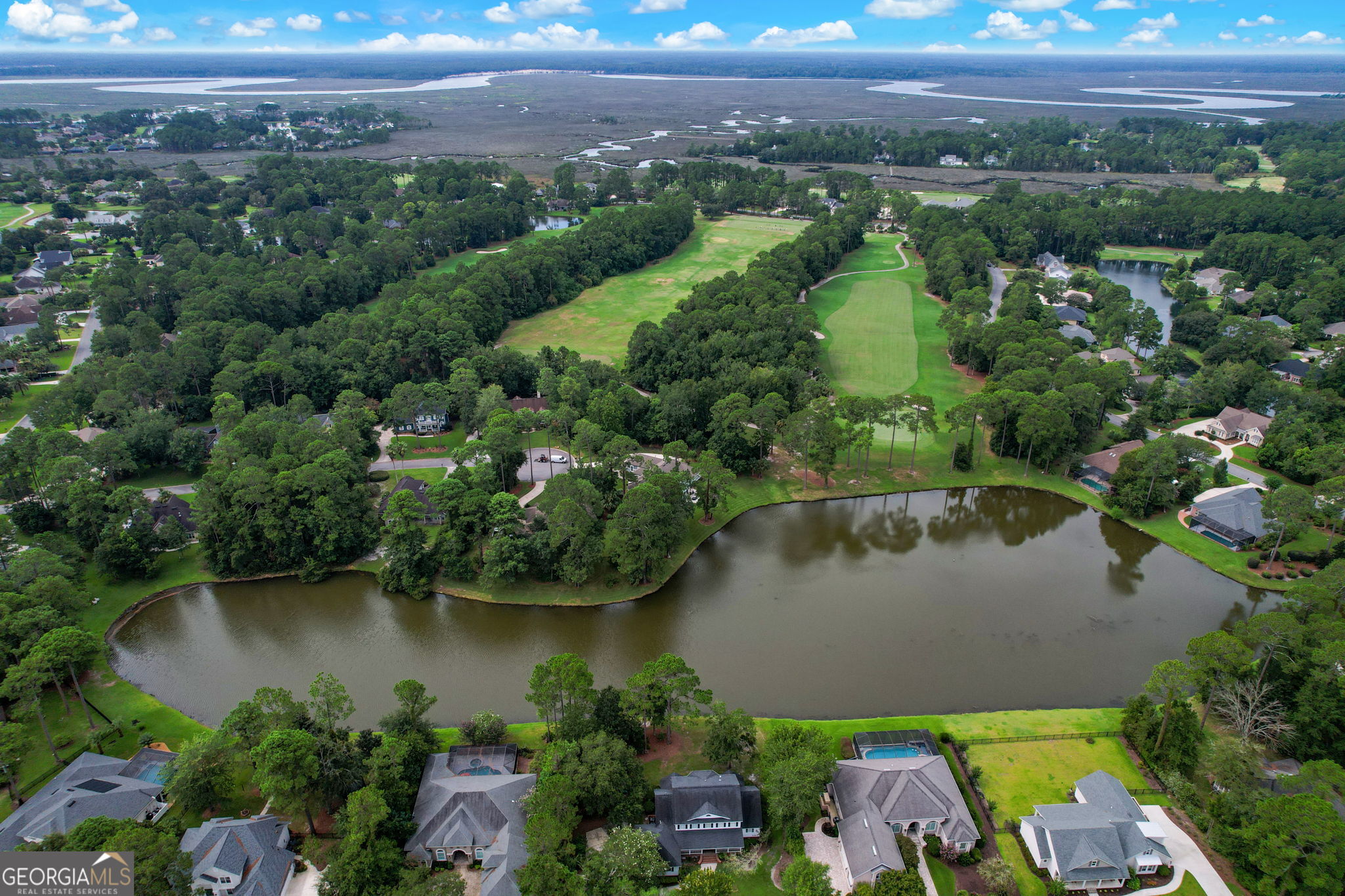 502 Cardinal Circle East St. Marys, GA 31558 - Photo 50 of 73 an aerial view of a house with a lake view