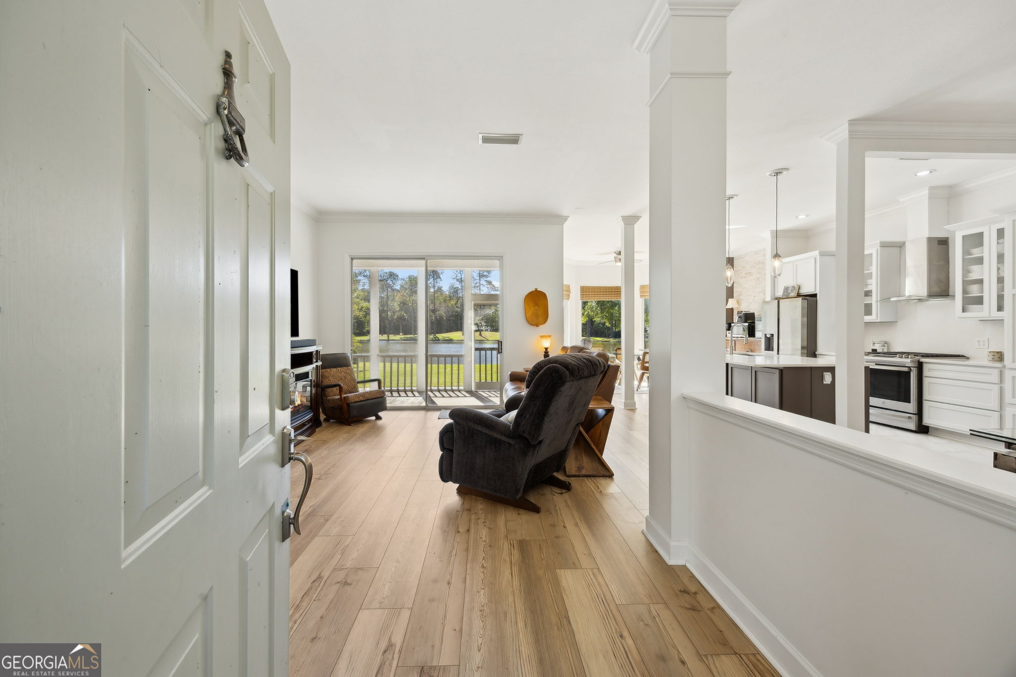 502 Cardinal Circle East St. Marys, GA 31558 - Photo 8 of 73 a living room with furniture and a large window