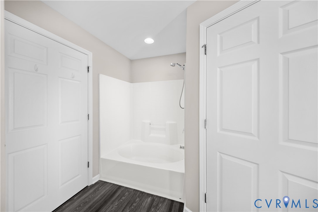 620 Fern Meadow Loop, Unit 305 Midlothian, VA 23114 - Photo 13 of 17 a bathroom with a bathtub