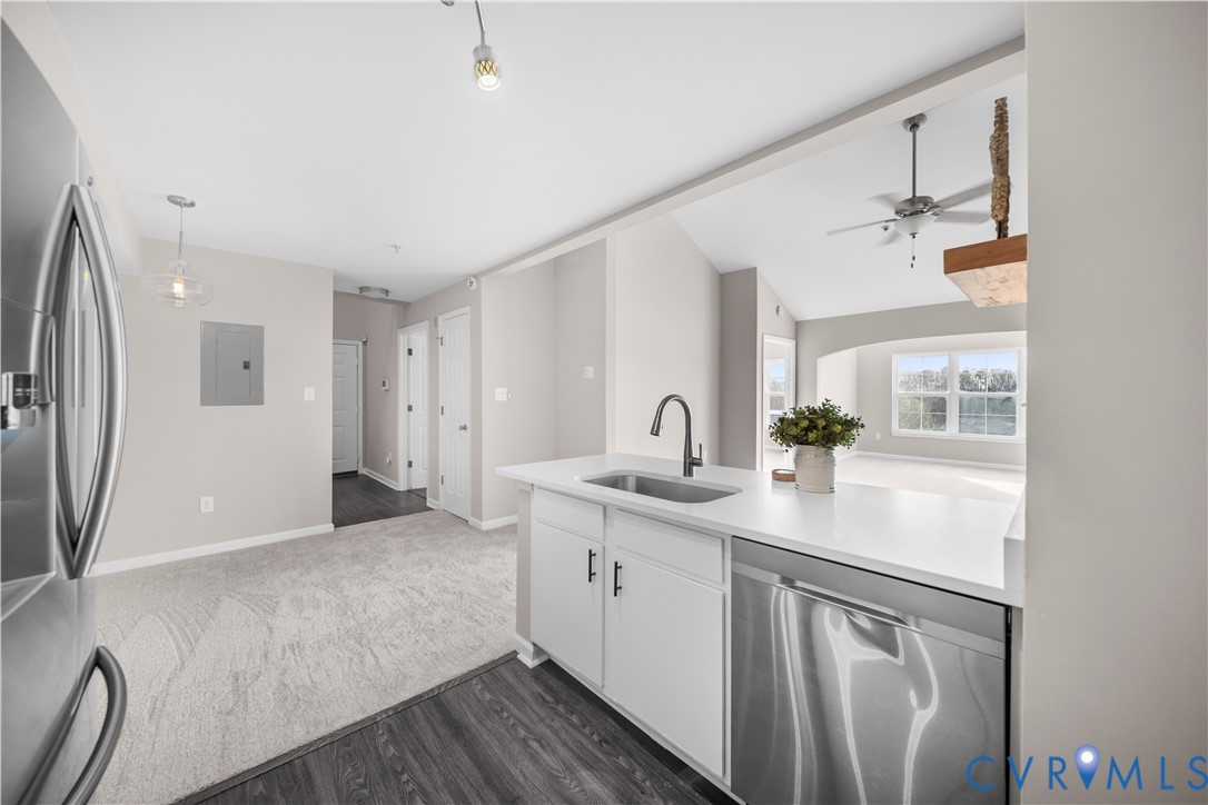 620 Fern Meadow Loop, Unit 305 Midlothian, VA 23114 - Photo 4 of 17 a kitchen with a sink and refrigerator
