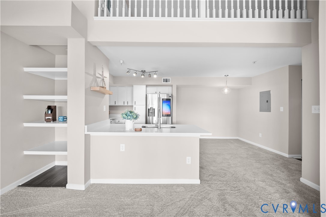 620 Fern Meadow Loop, Unit 305 Midlothian, VA 23114 - Photo 6 of 17 a view of kitchen with kitchen island and stainless steel appliances