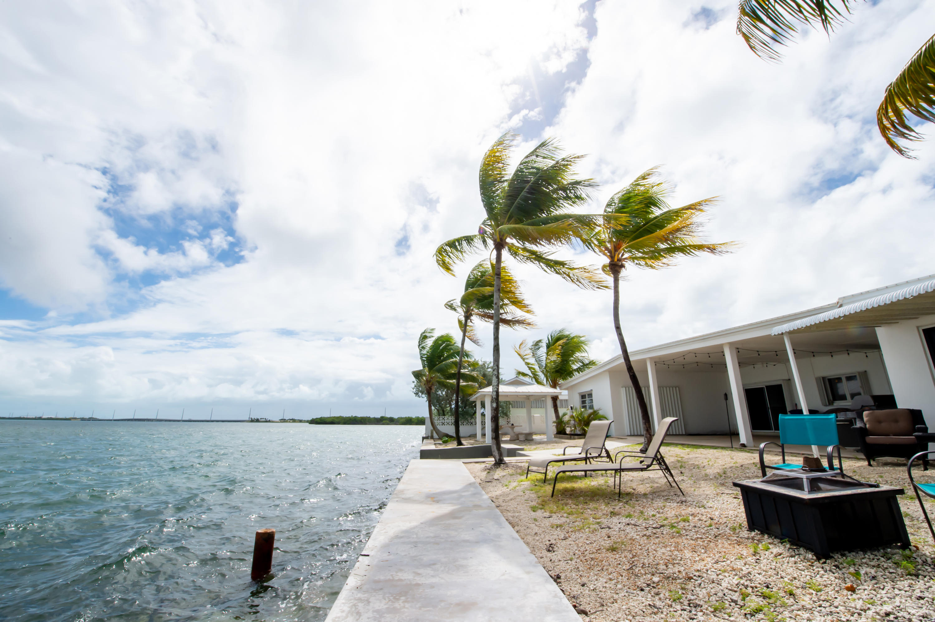 2 Allamanda Terrace Key West, FL 33040 - Photo 22 of 29 a view of a backyard with swimming pool and furniture