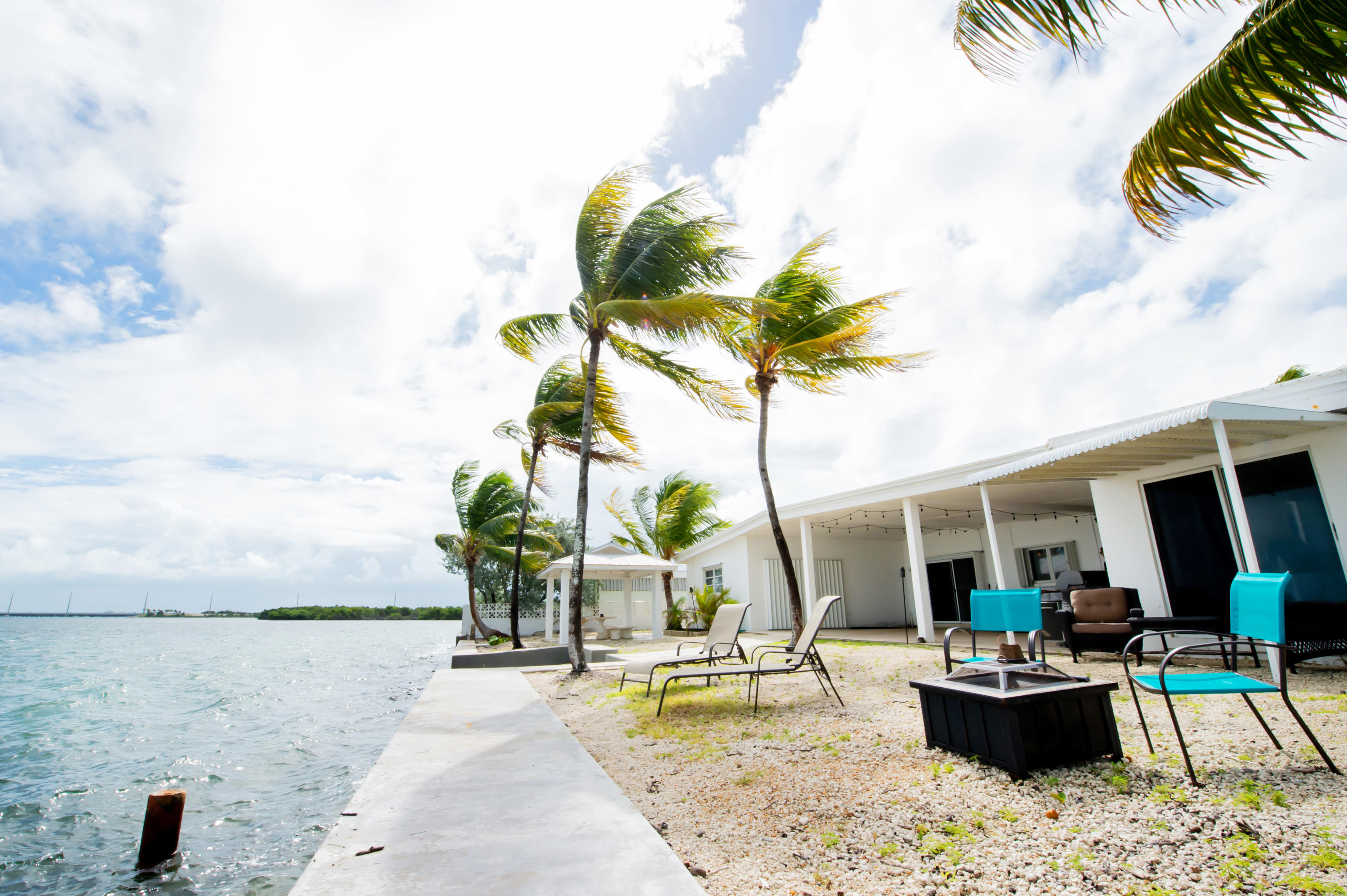 2 Allamanda Terrace Key West, FL 33040 - Photo 23 of 29 a view of a backyard with swimming pool and furniture