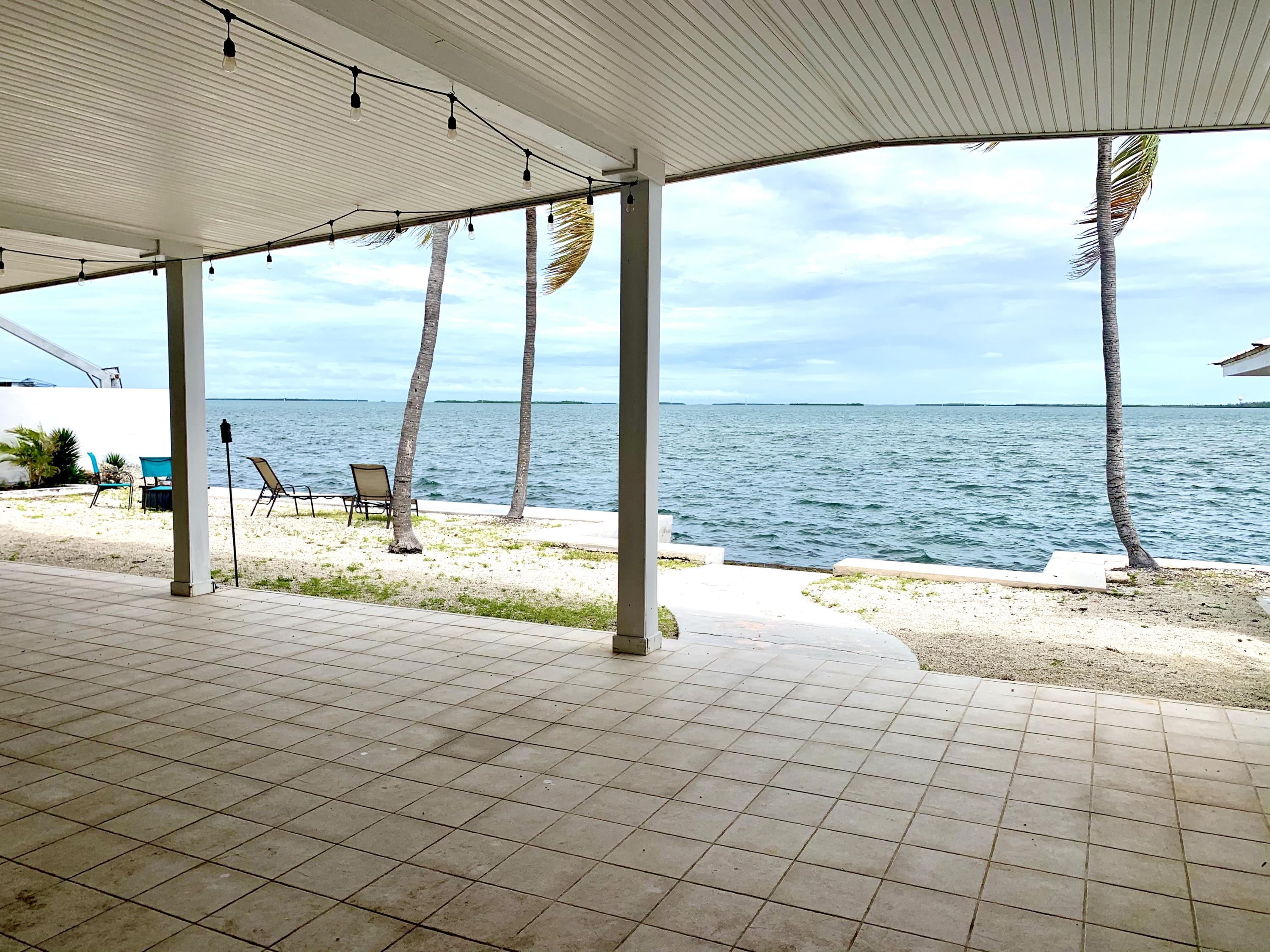 2 Allamanda Terrace Key West, FL 33040 - Photo 26 of 29 a view of an empty room with glass windows