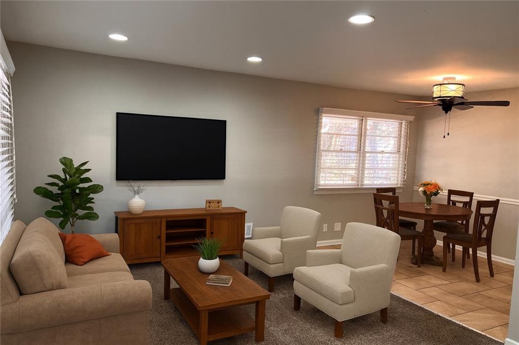 2047 Panstone Court Southwest Marietta, GA 30060 - Photo 3 of 18 a living room with furniture a dining table and a piano