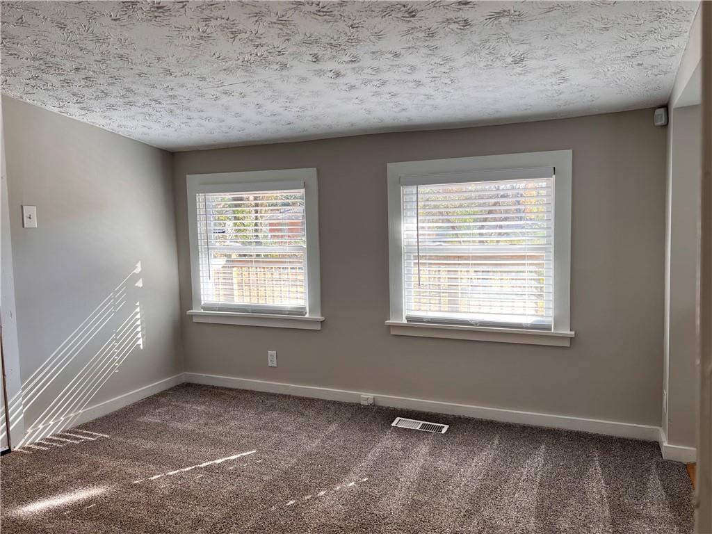 2047 Panstone Court Southwest Marietta, GA 30060 - Photo 9 of 18 an empty room with a window