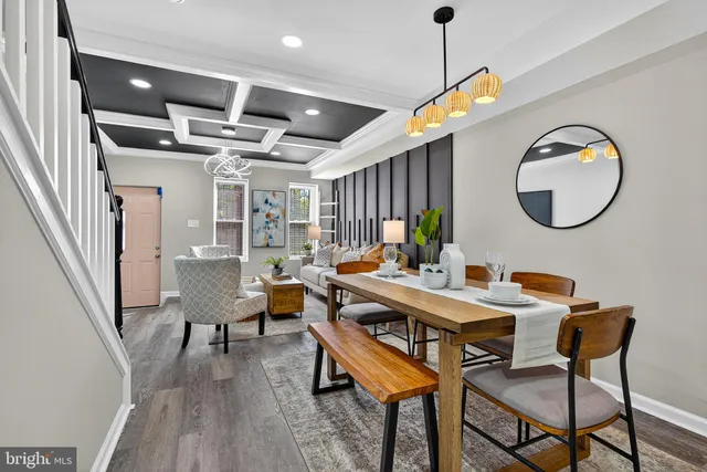 a living room with a table tennis table and a potted plant