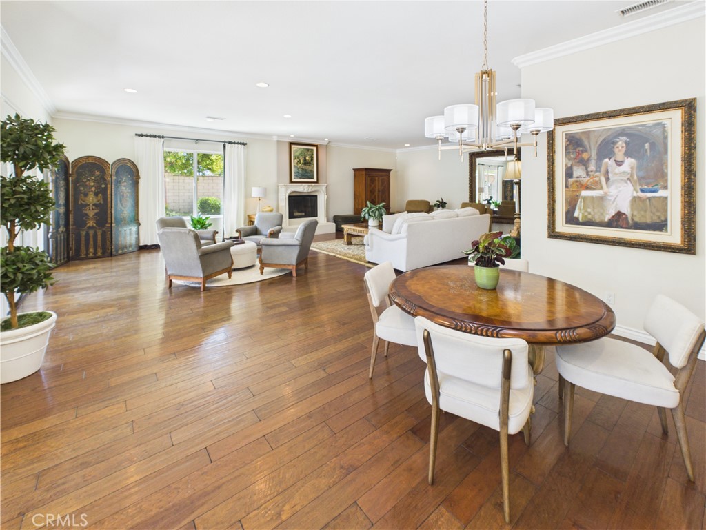 1662 Cherokee Road Corona, CA 92881 - Photo 21 of 60 a view of a dining room with furniture window and wooden floor