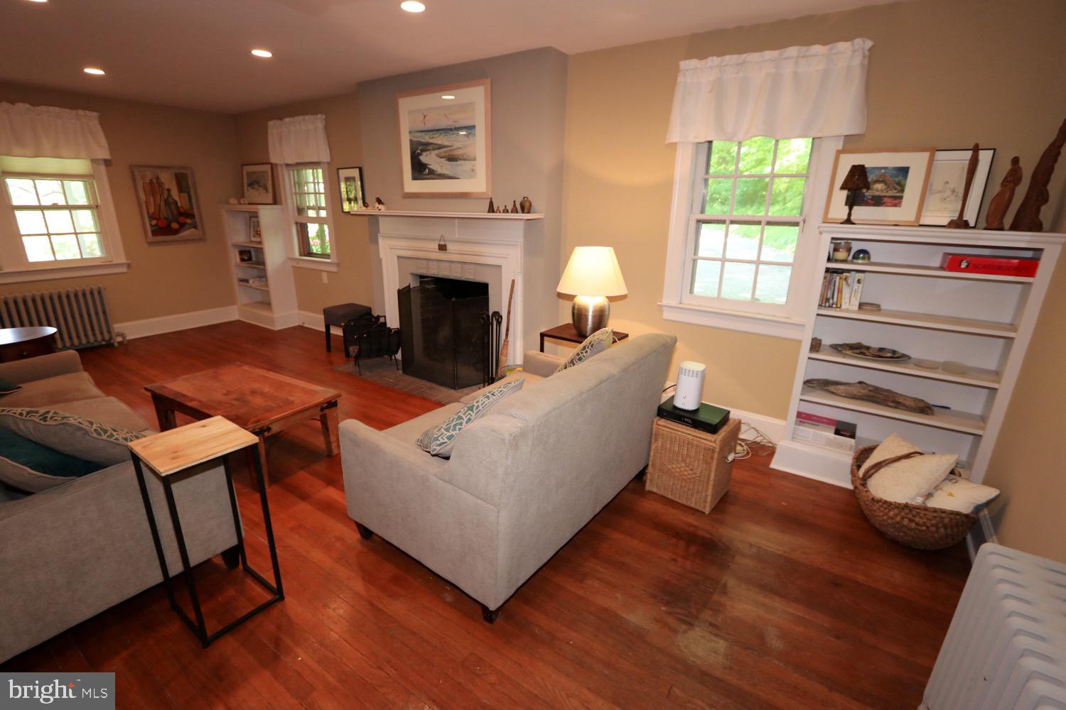 2701 Alden Road Bryn Athyn, PA 19006 - Photo 47 of 105 a living room with furniture and a fireplace
