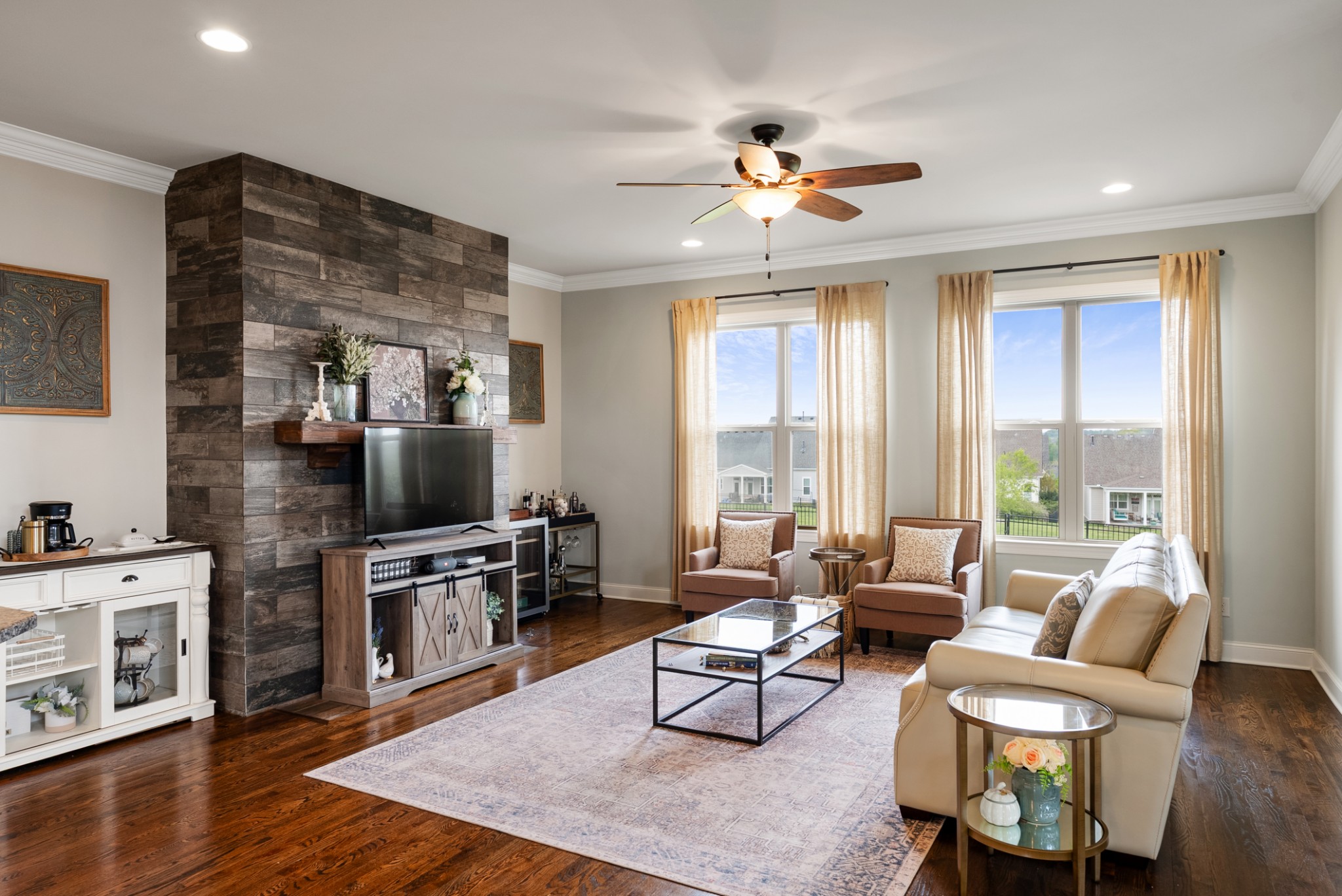 148 Truman Road West Franklin, TN 37064 - Photo 8 of 42 a living room with fireplace furniture and a flat screen tv