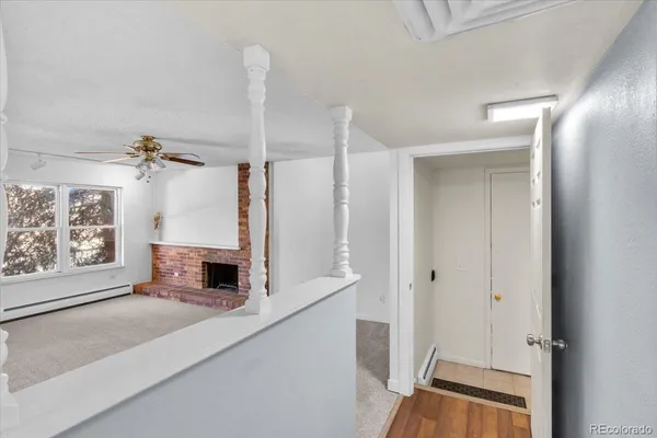 a kitchen with stainless steel appliances a refrigerator and a window