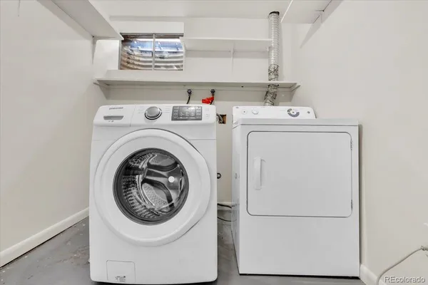a utility room with dryer and washer