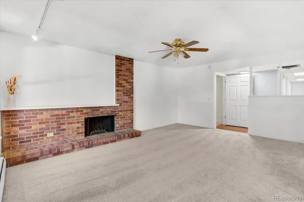 a view of livingroom with a fireplace