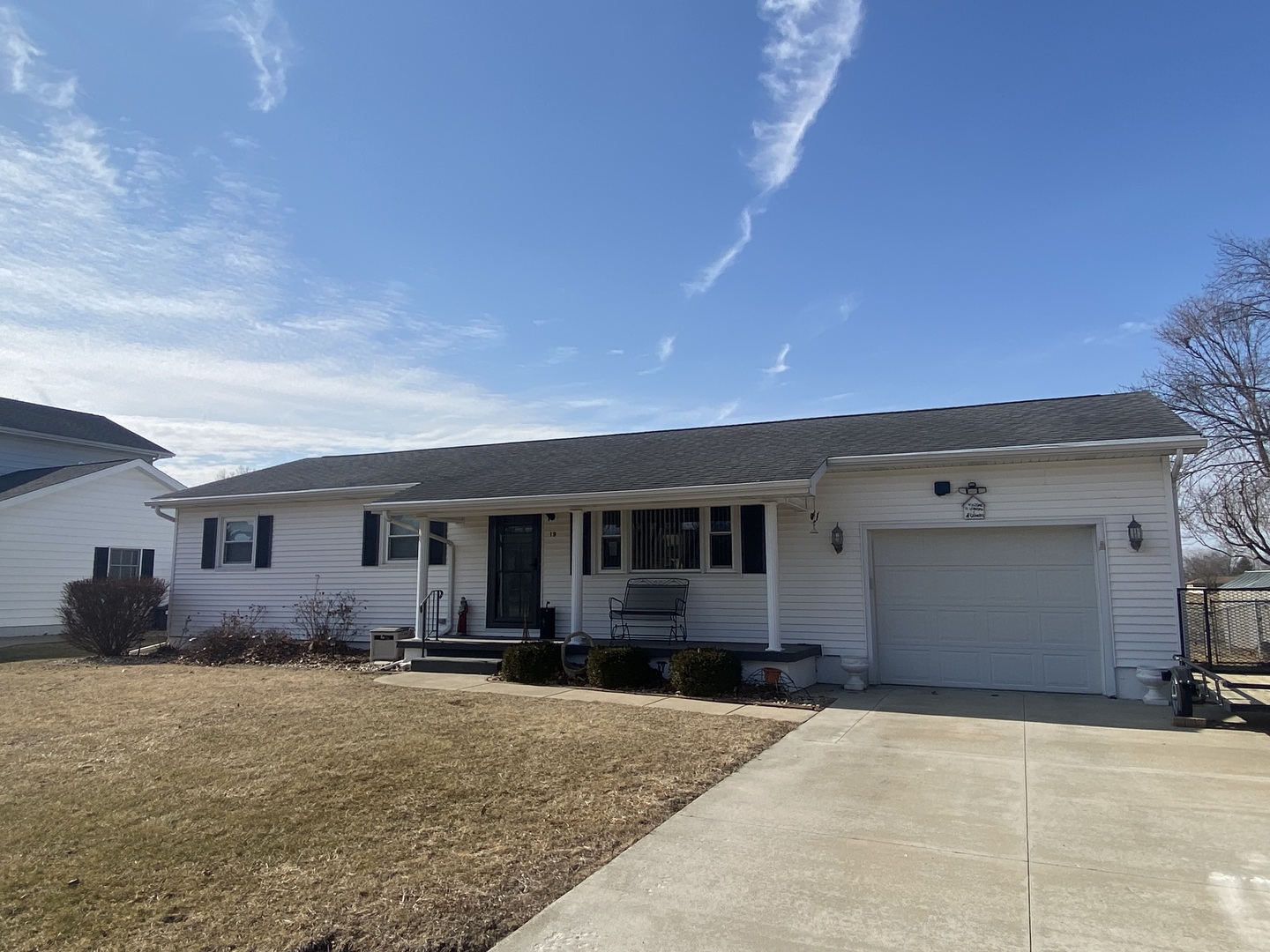 19 Capri Street Streator, IL 61364 - Photo 2 of 35 a front view of a house with a yard and garage