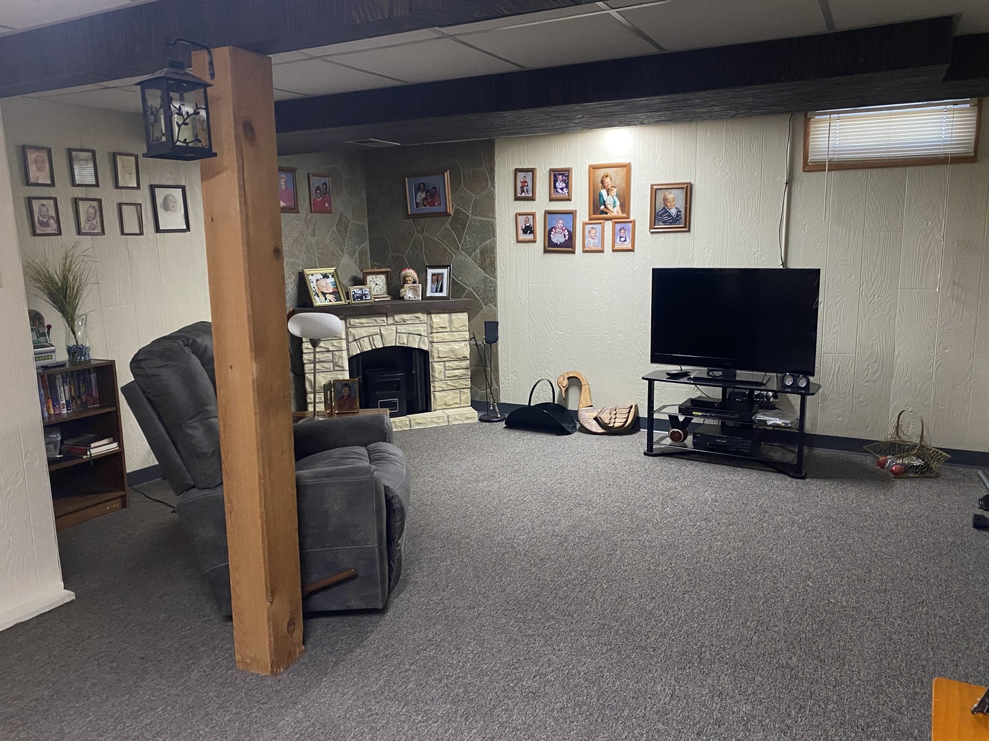 19 Capri Street Streator, IL 61364 - Photo 27 of 35 a living room with furniture and a flat screen tv