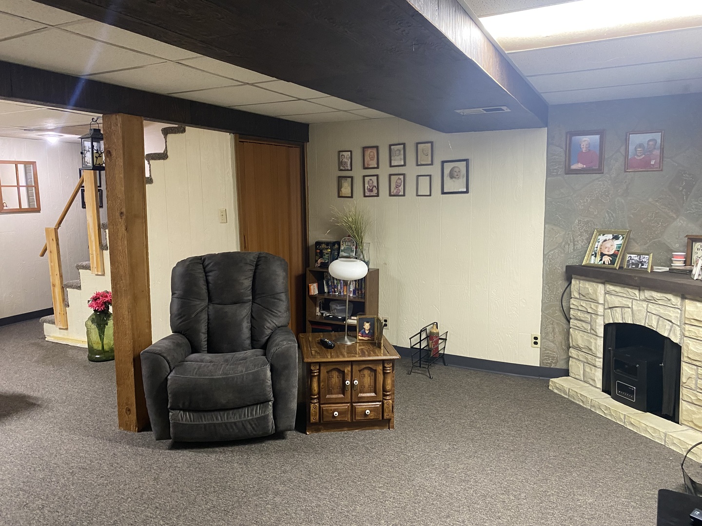 19 Capri Street Streator, IL 61364 - Photo 30 of 35 a living room with furniture and a fireplace