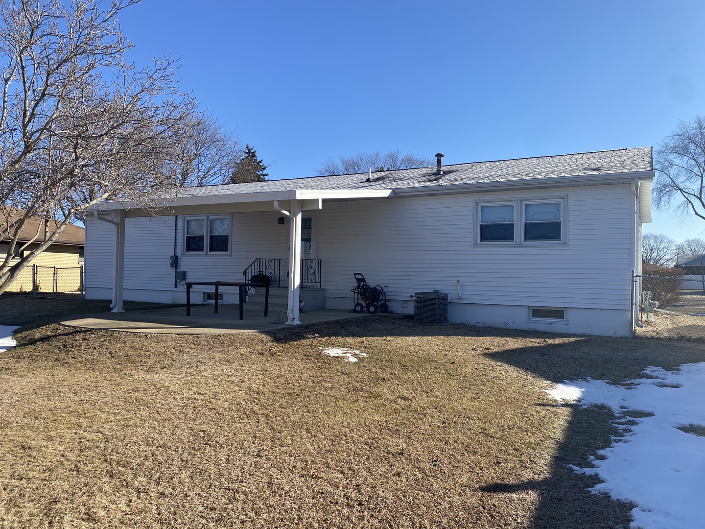 19 Capri Street Streator, IL 61364 - Photo 34 of 35 a backyard of a house with table and chairs