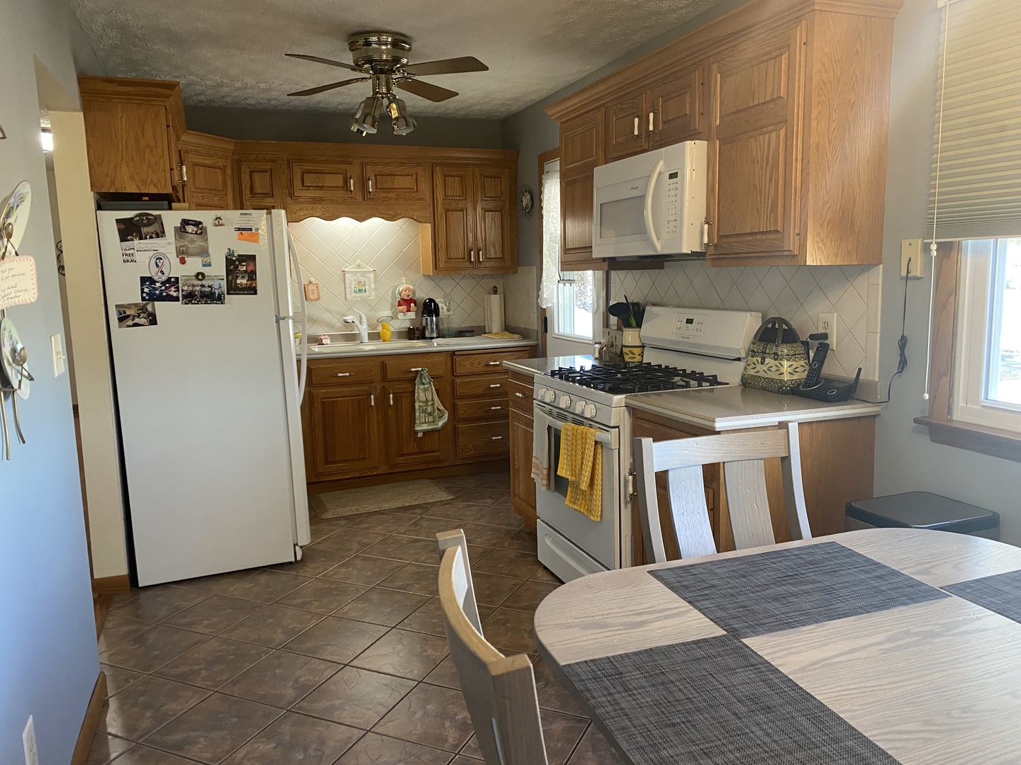 19 Capri Street Streator, IL 61364 - Photo 5 of 35 a kitchen with a refrigerator a sink and dishwasher