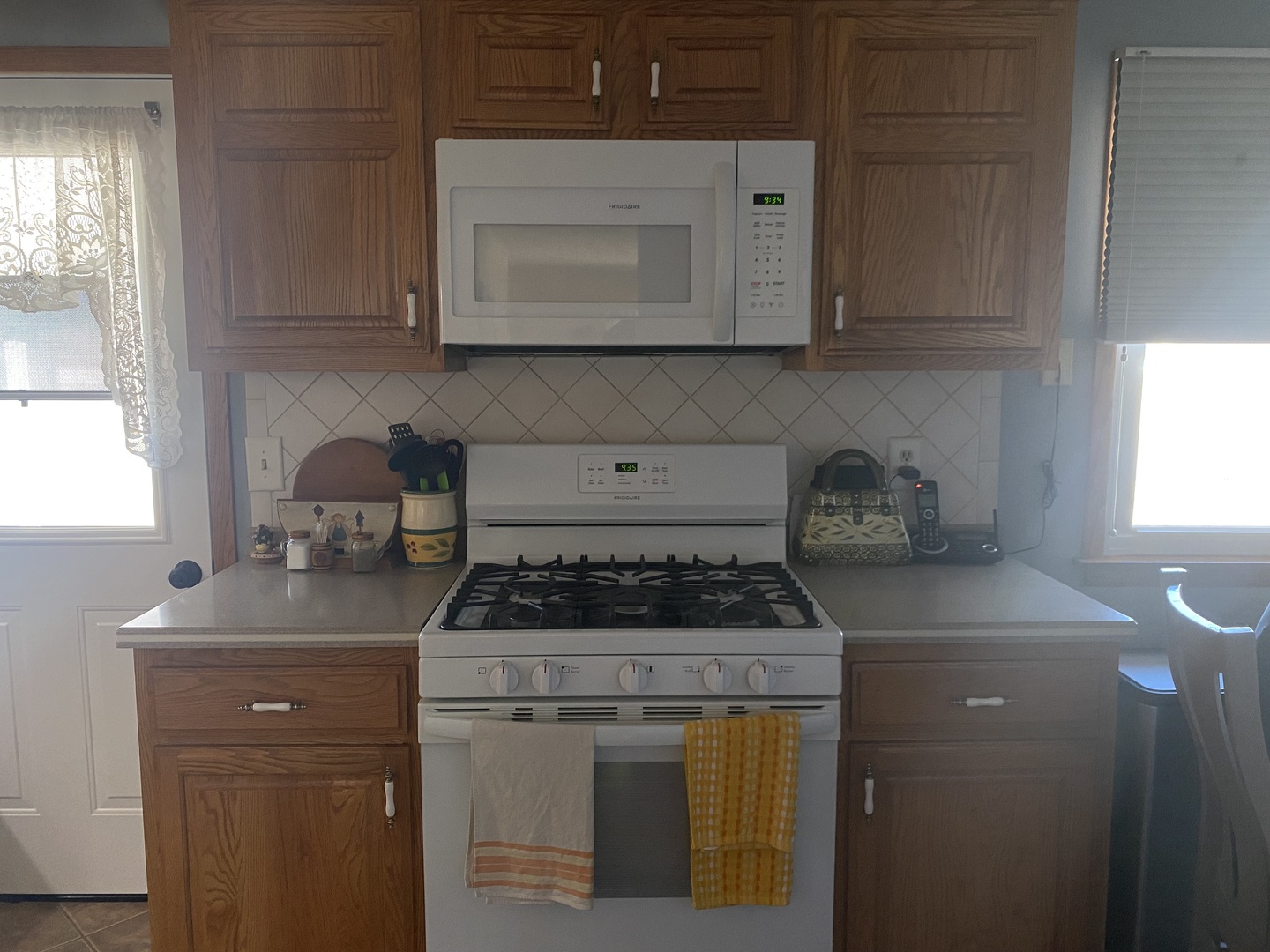 19 Capri Street Streator, IL 61364 - Photo 6 of 35 a kitchen with stainless steel appliances granite countertop white cabinets and a stove top oven